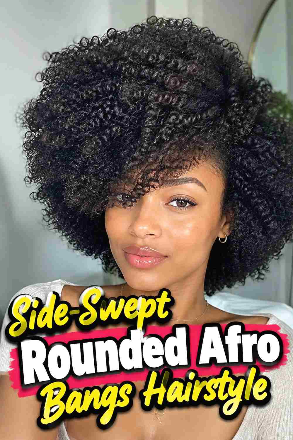 8. Side Swept Rounded Afro Bangs Hairstyle