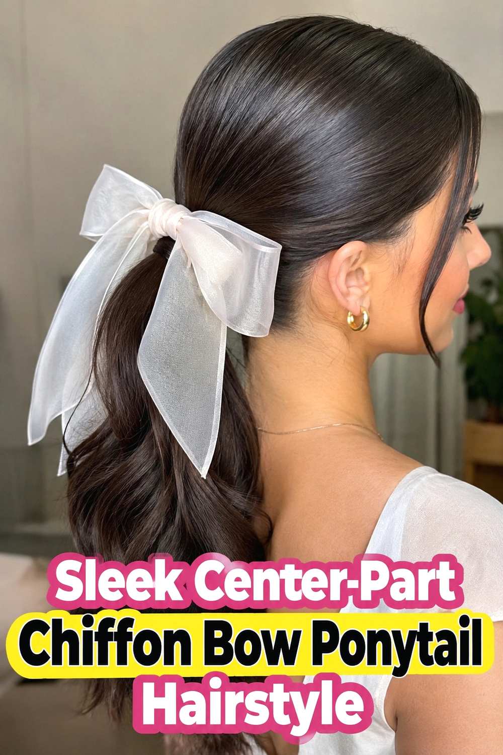 4. Sleek Center Part Chiffon Bow Ponytail Hairstyle