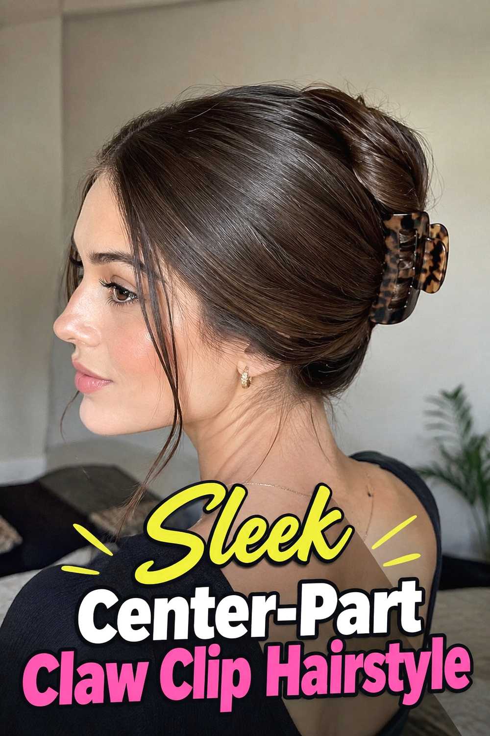 11. Sleek Center Part Claw Clip Hairstyle