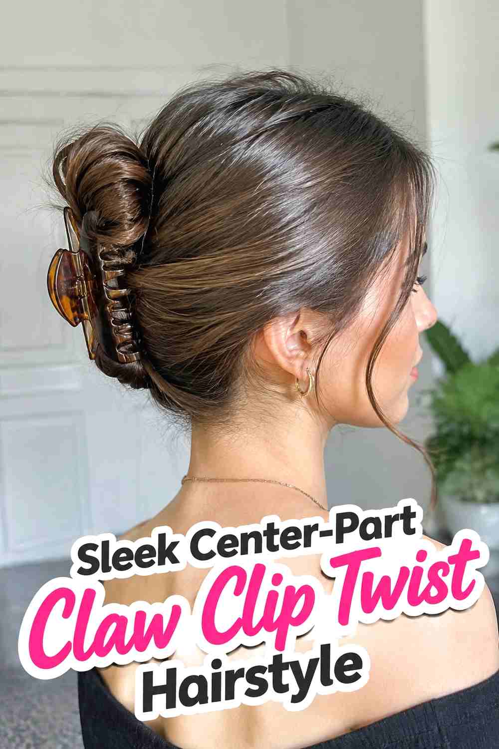 3. Sleek Center Part Claw Clip Twist Hairstyle