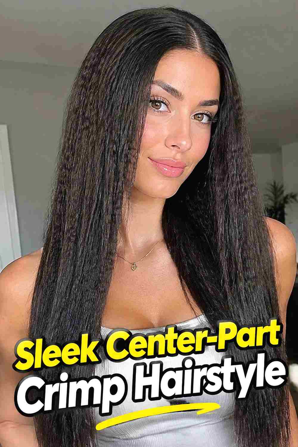 1. Sleek Center Part Crimp Hairstyle