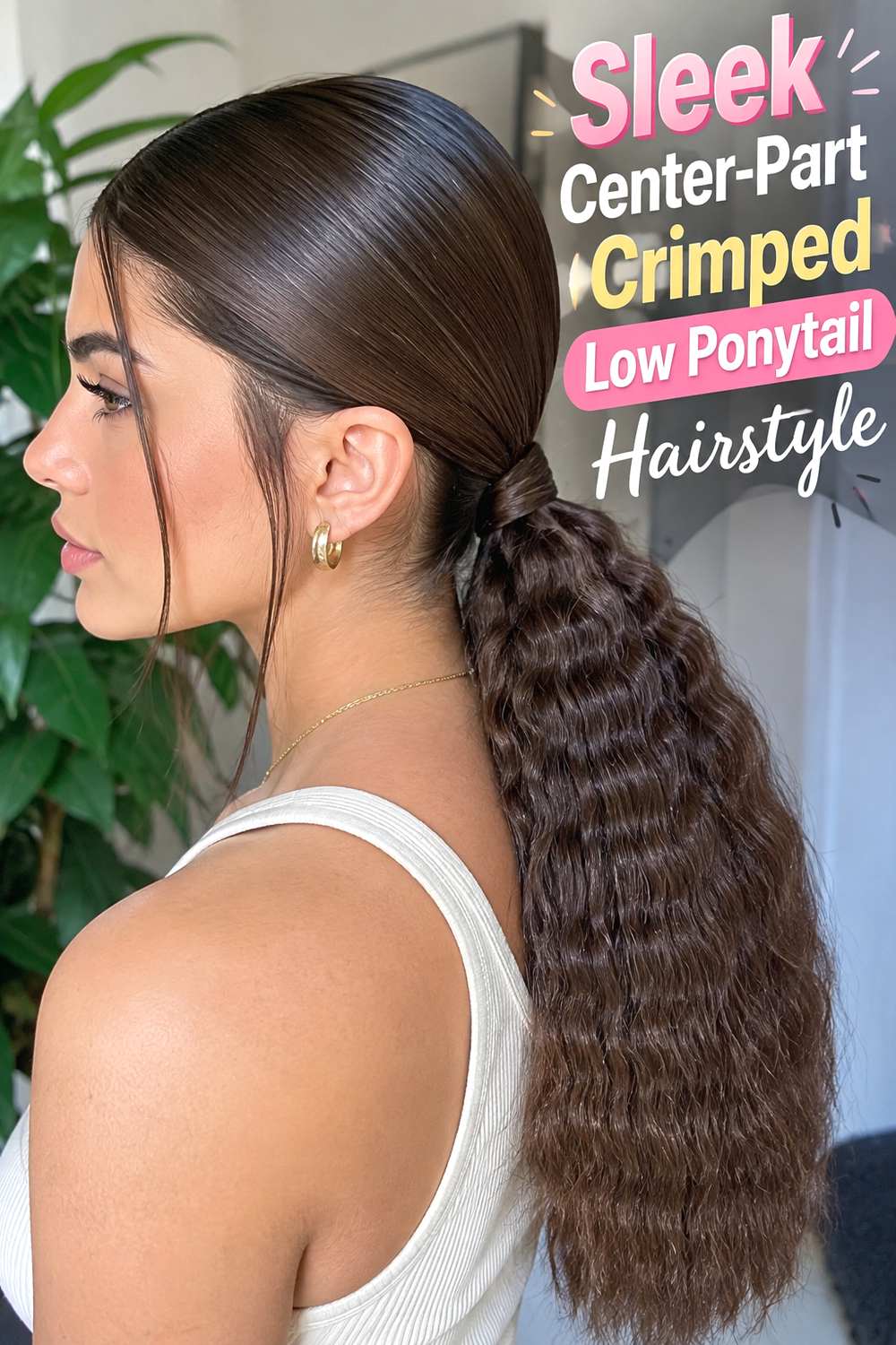 Sleek Center-Part Crimped Low Ponytail Hairstyle
