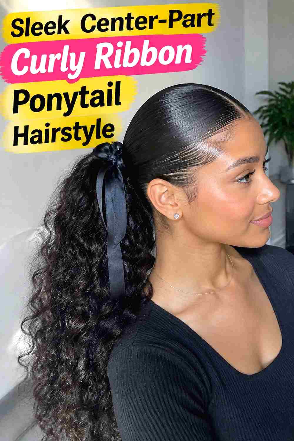 13. Sleek Center Part Curly Ribbon Ponytail Hairstyle