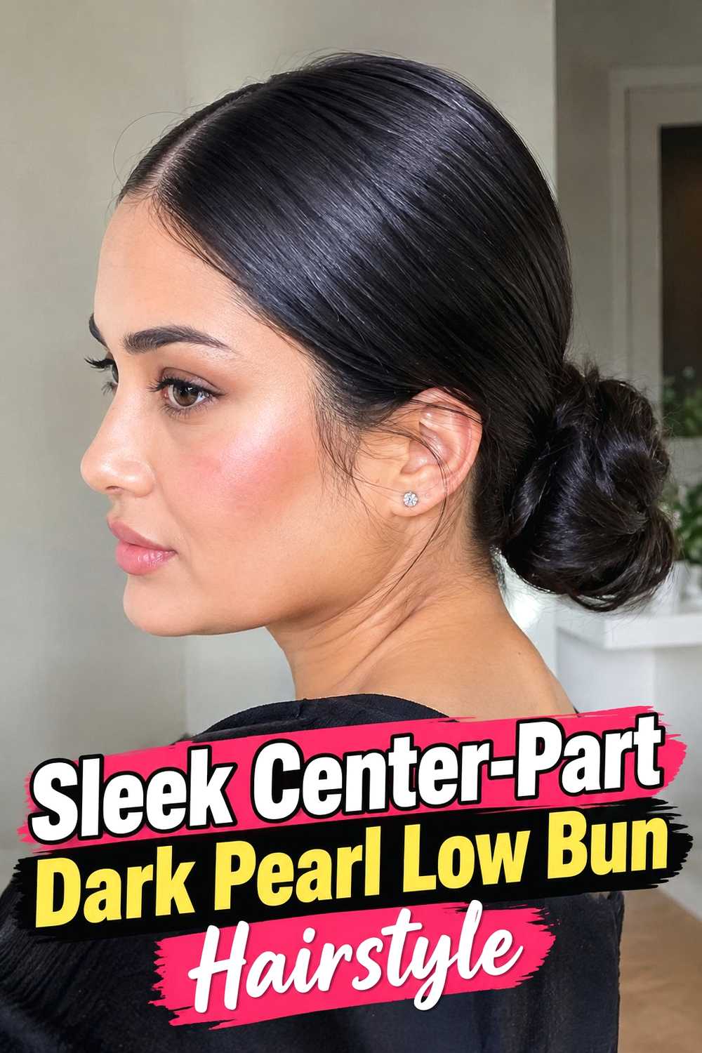 1. Sleek Center Part Dark Pearl Low Bun Hairstyle