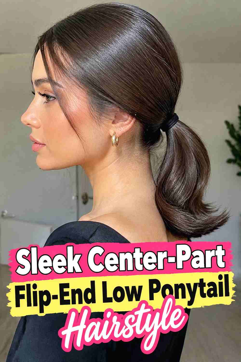2. Sleek Center Part Flip End Low Ponytail Hairstyle