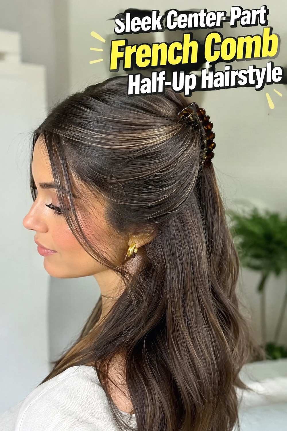 3. Sleek Center Part French Comb Half Up Hairstyle