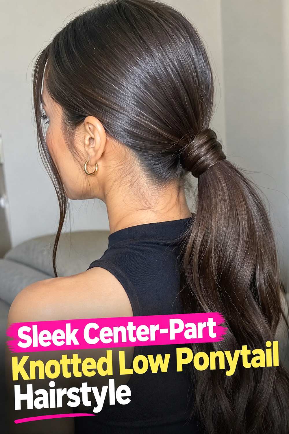 Sleek Center-Part Knotted Low Ponytail Hairstyle