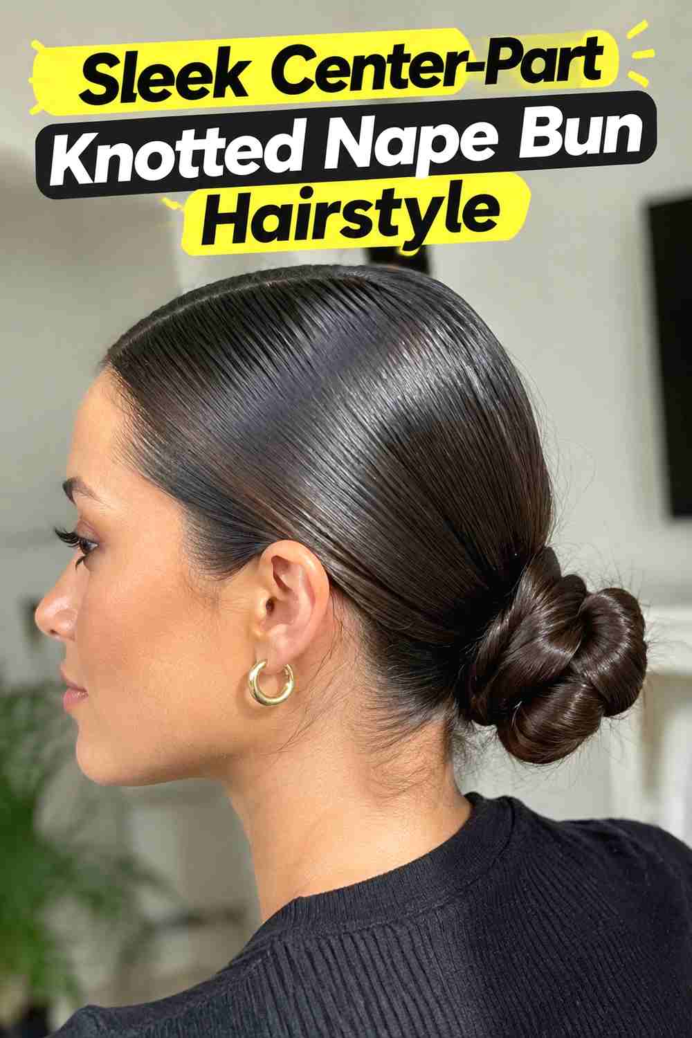 2. Sleek Center Part Knotted Nape Bun Hairstyle