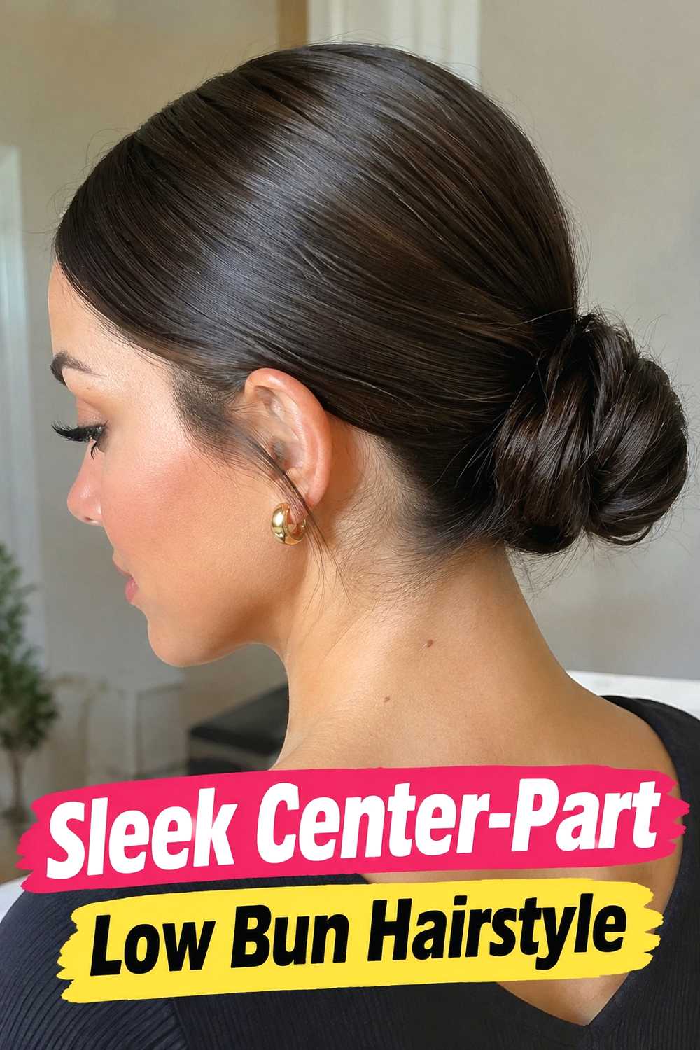 2. Sleek Center Part Low Bun Hairstyle 1