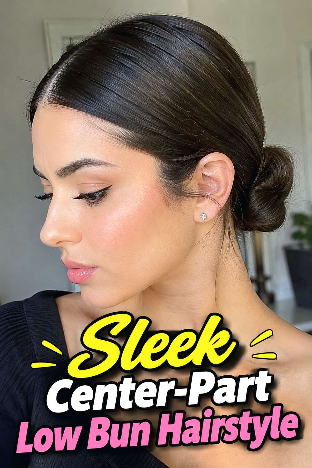 Sleek Center-Part Low Bun Hairstyle
