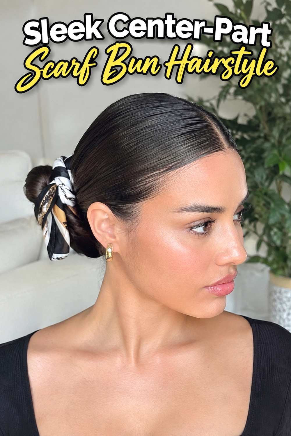 7. Sleek Center Part Scarf Bun Hairstyle
