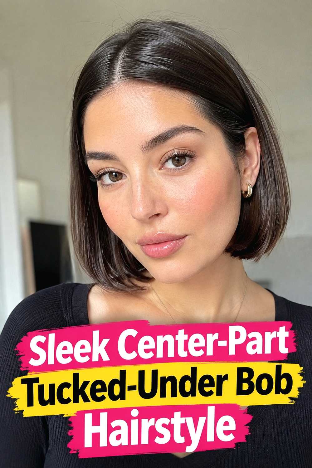 2. Sleek Center Part Tucked Under Bob Hairstyle