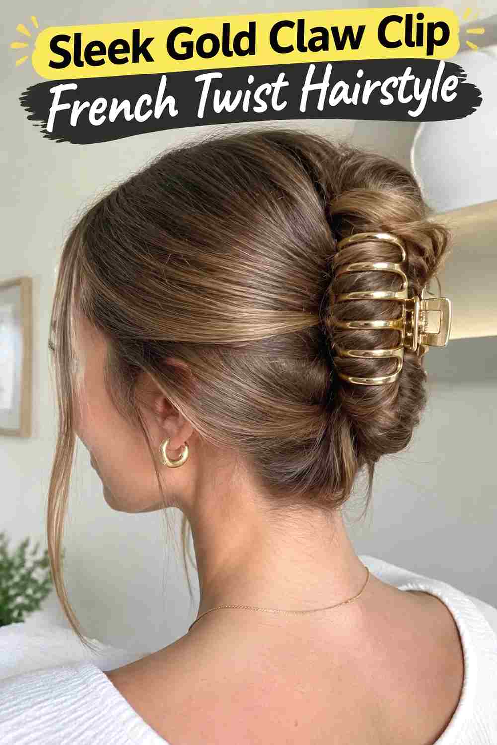 7. Sleek Gold Claw Clip French Twist Hairstyle
