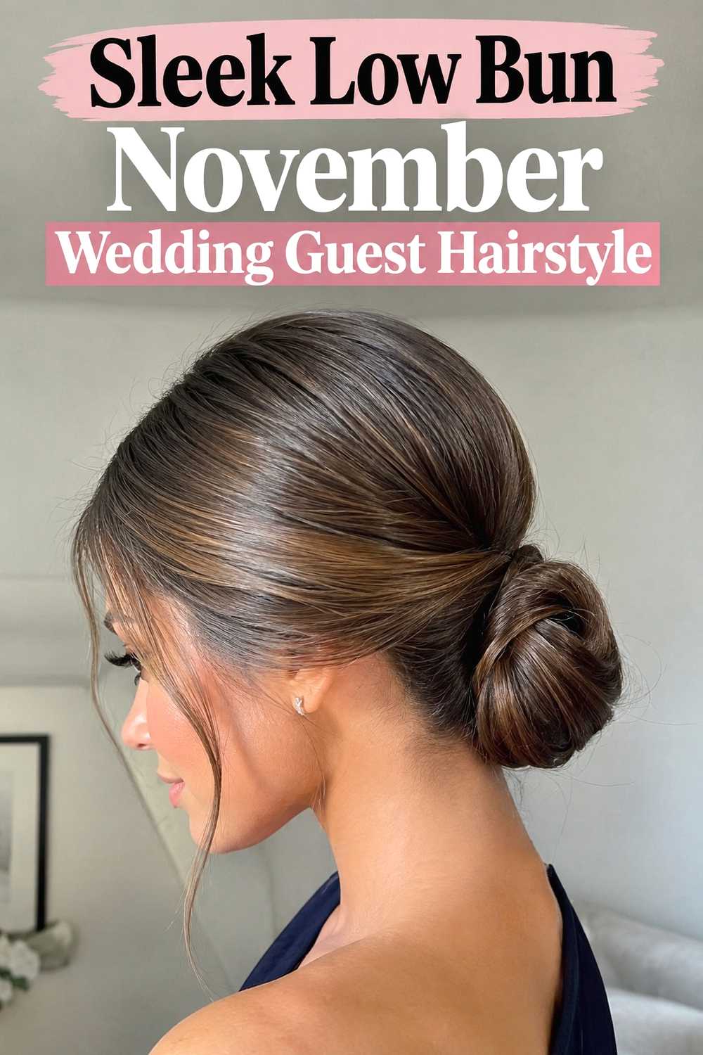 6. Sleek Low Bun November Wedding Guest Hairstyle