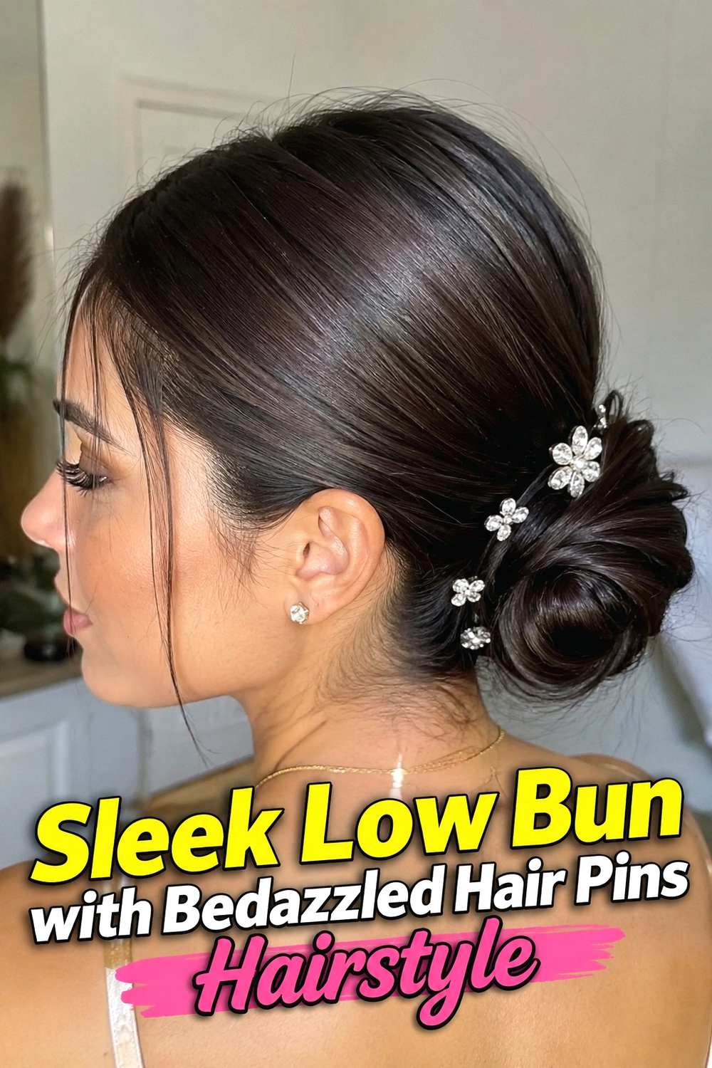 1. Sleek Low Bun With Bedazzled Hair Pins Hairstyle