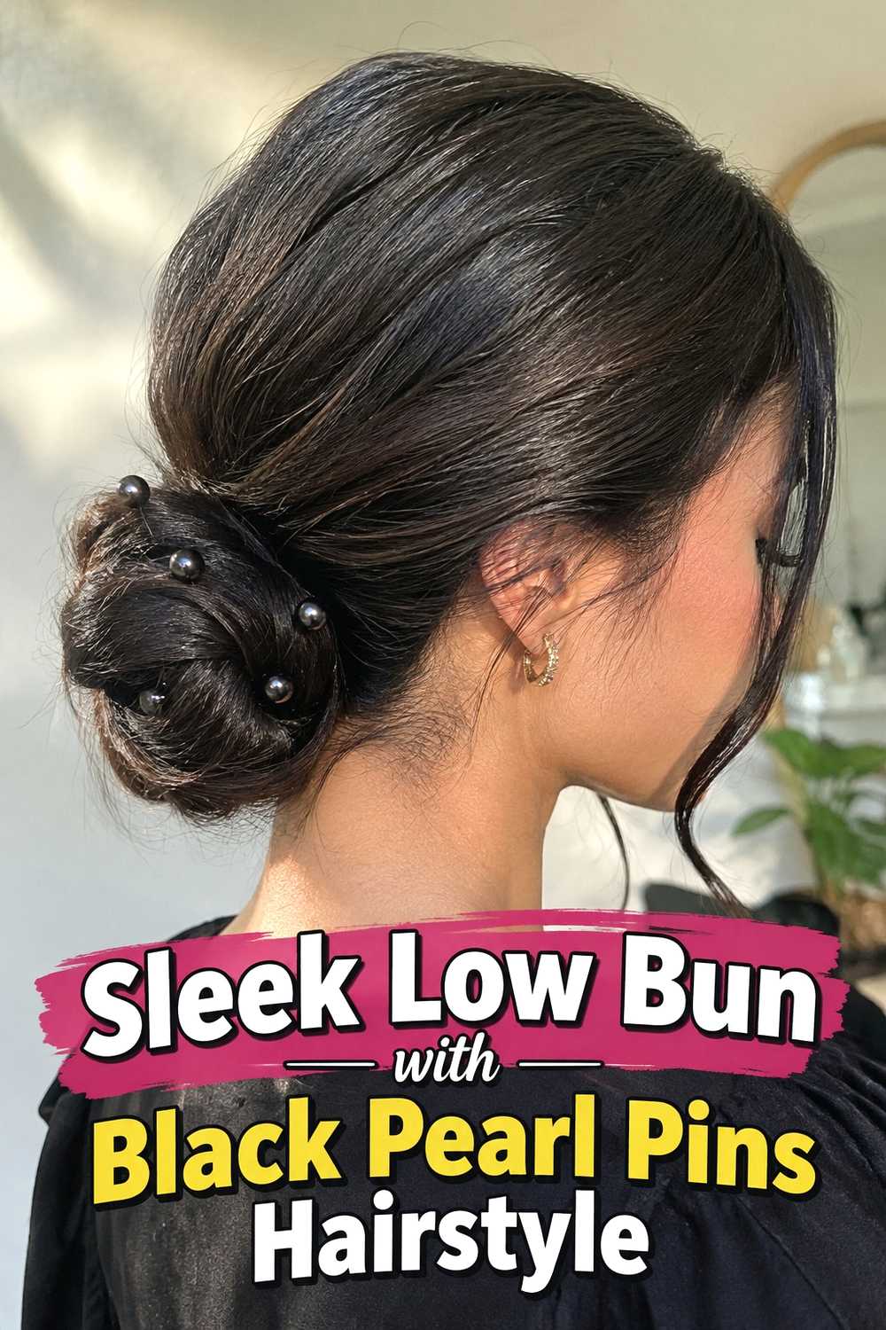 1. Sleek Low Bun With Black Pearl Pins Hairstyle