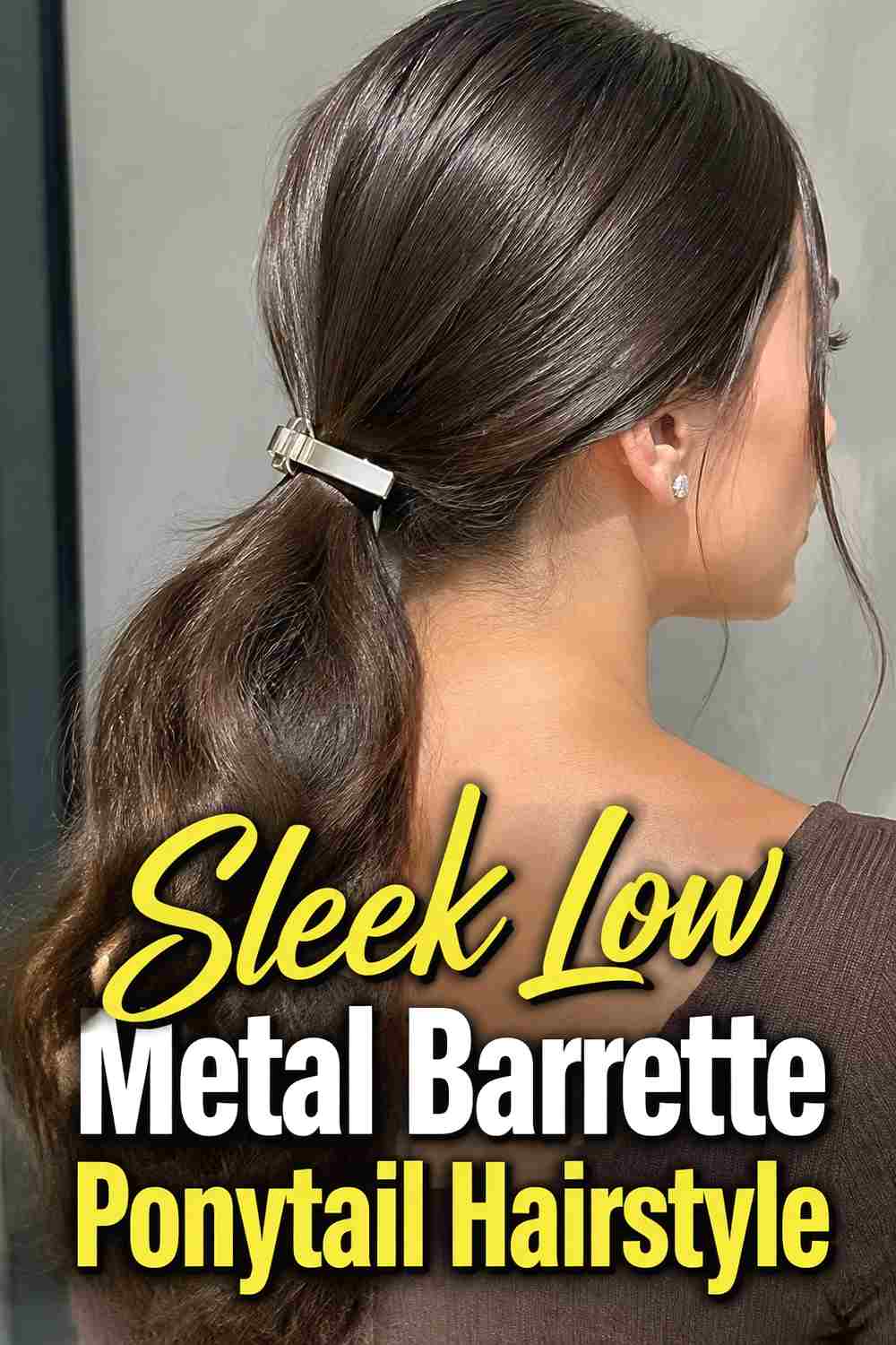 4. Sleek Low Metal Barrette Ponytail Hairstyle