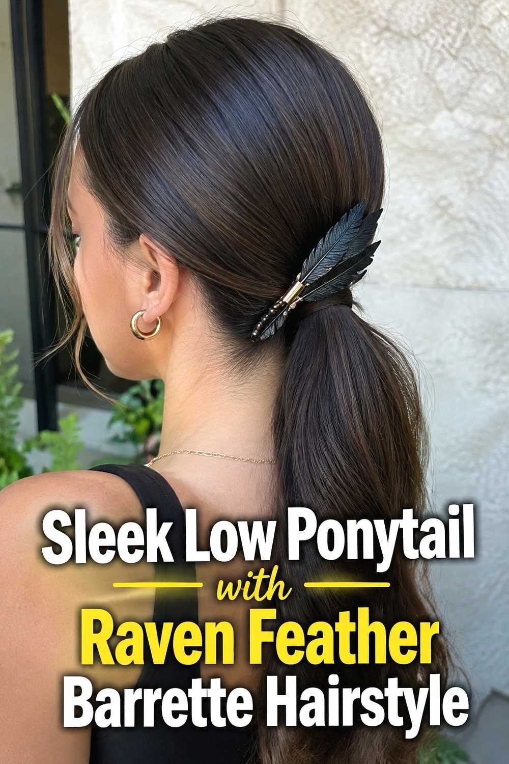 5. Sleek Low Ponytail With Raven Feather Barrette Hairstyle