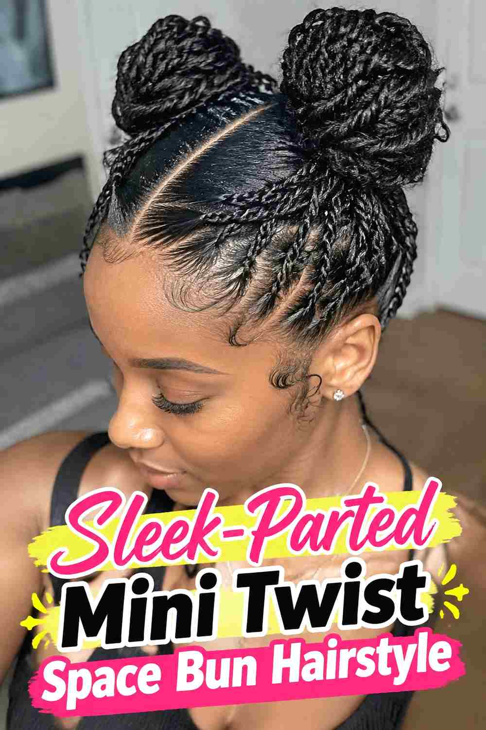 6. Sleek Parted Mini Twist Space Bun Hairstyle