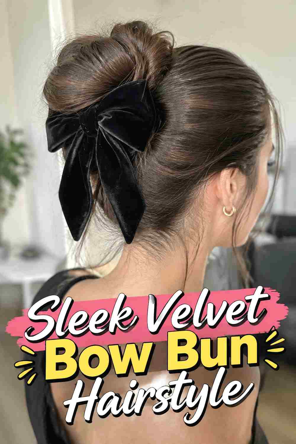 2. Sleek Velvet Bow Bun Hairstyle