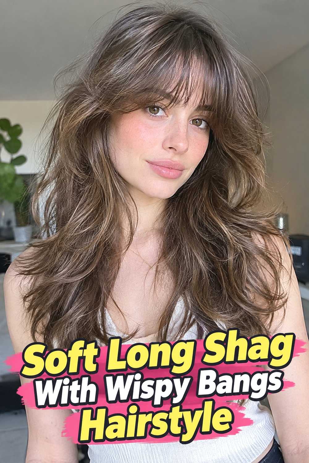 2. Soft Long Shag With Wispy Bangs Hairstyle
