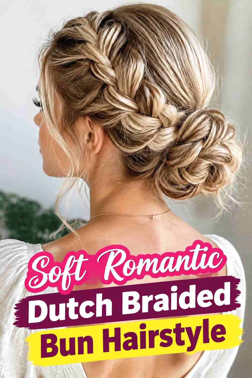 12. Soft Romantic Dutch Braided Bun Hairstyle