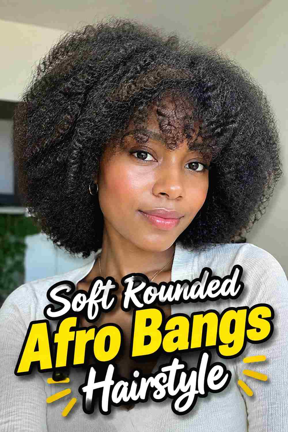 1. Soft Rounded Afro Bangs Hairstyle