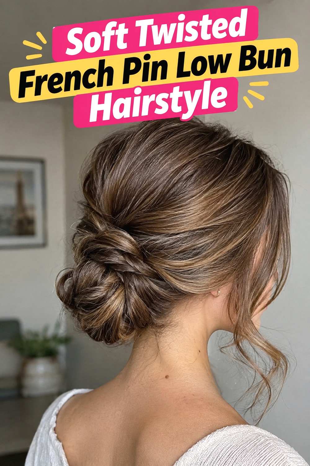 2. Soft Twisted French Pin Low Bun Hairstyle
