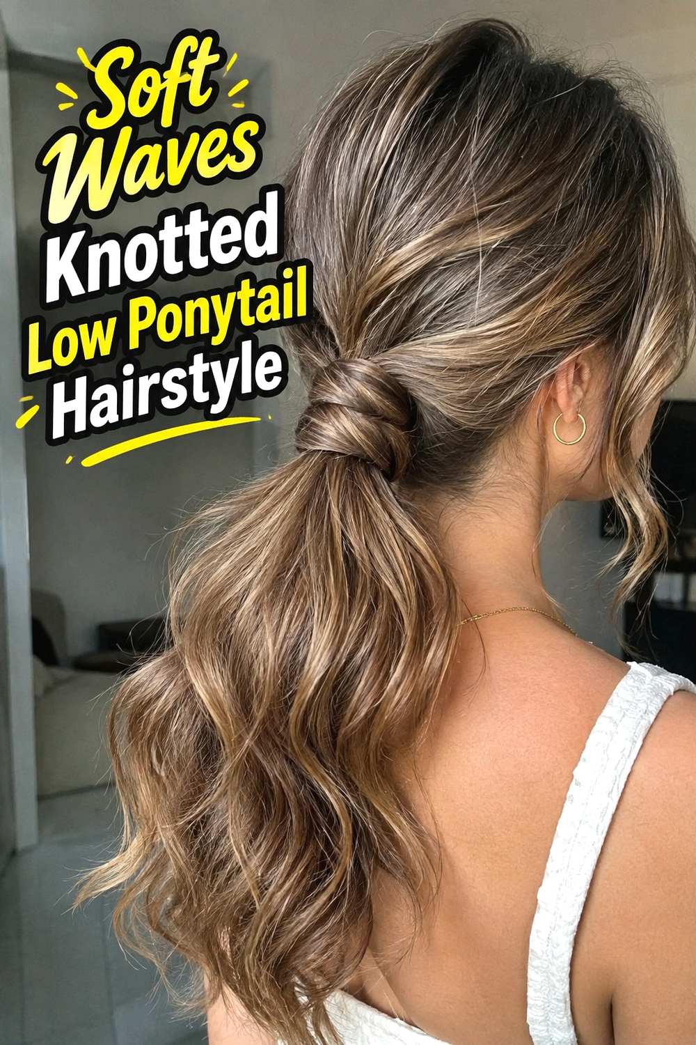 3. Soft Waves Knotted Low Ponytail Hairstyle
