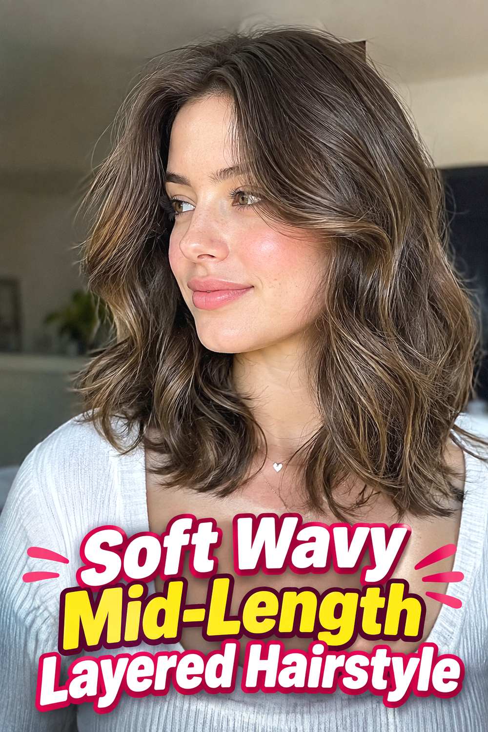 10. Soft Wavy Mid Length Layered Hairstyle