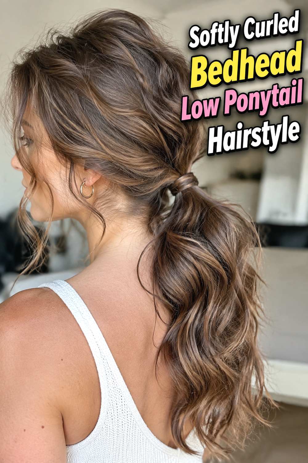 Softly Curled Bedhead Low Ponytail Hairstyle