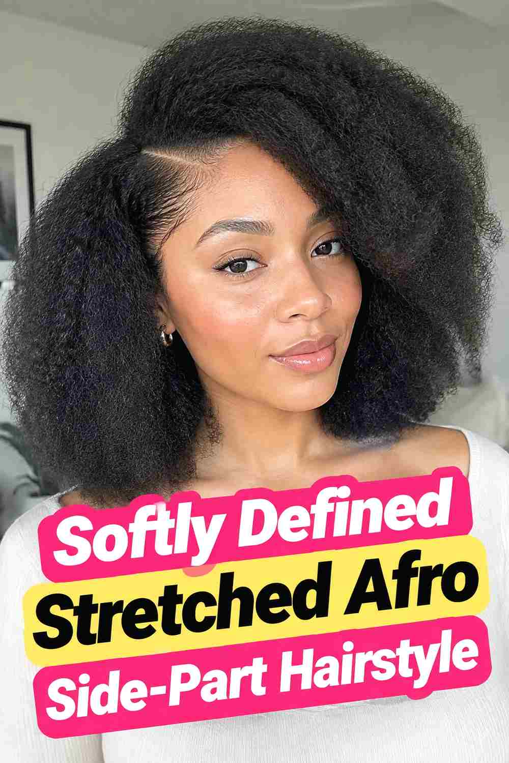 15. Softly Defined Stretched Afro Side Part Hairstyle