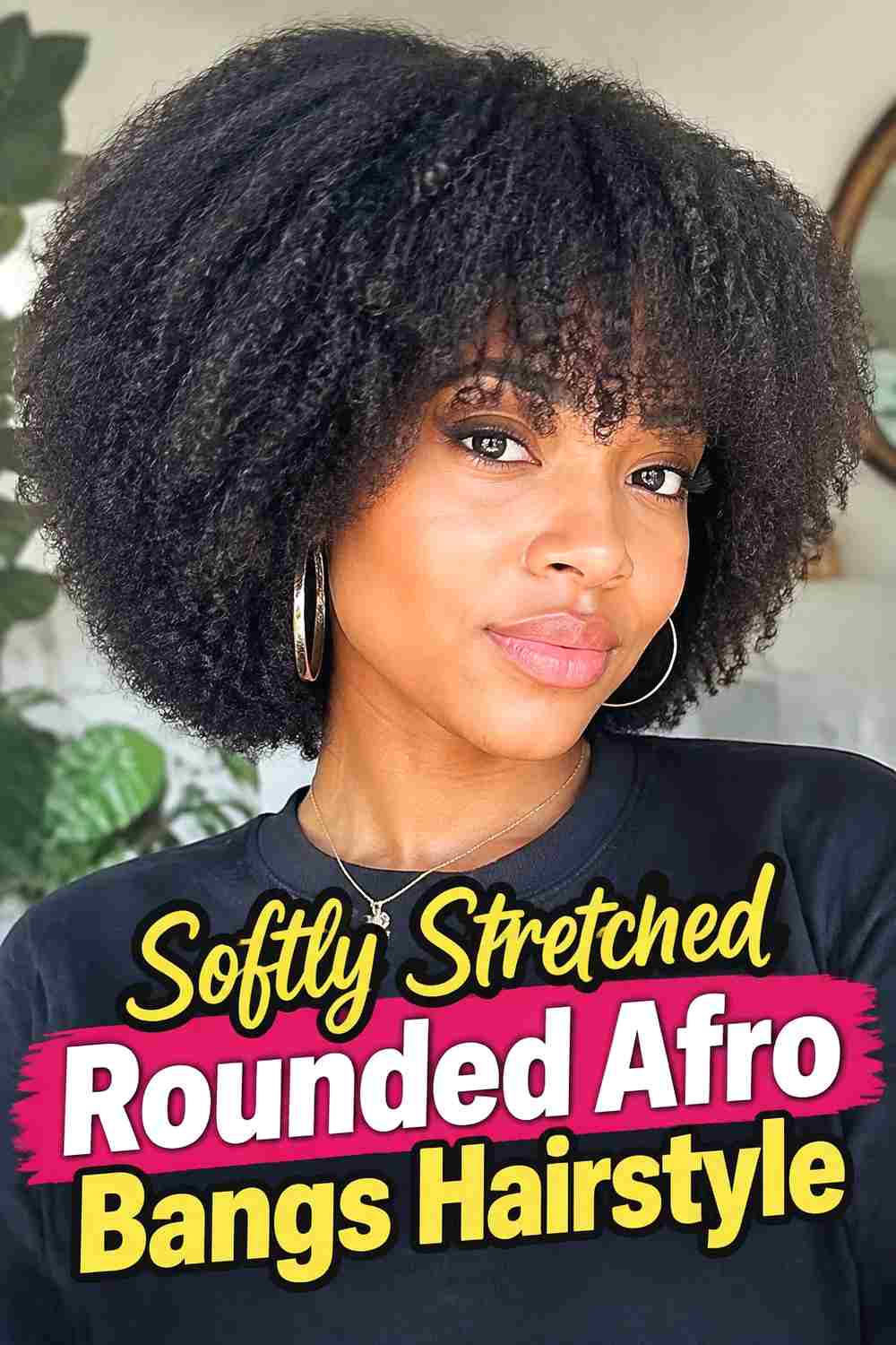 13. Softly Stretched Rounded Afro Bangs Hairstyle