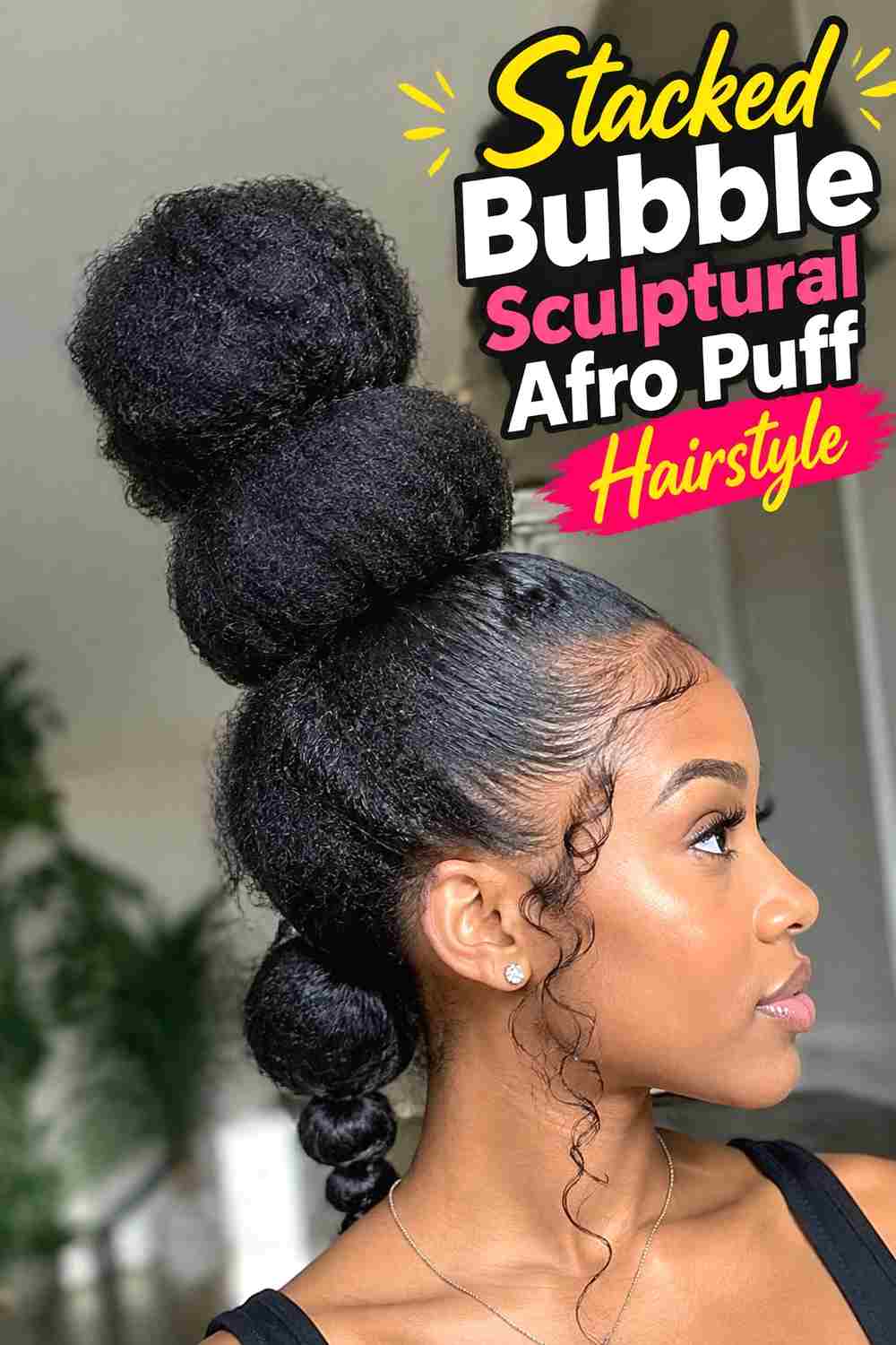 4. Stacked Bubble Sculptural Afro Puff Hairstyle