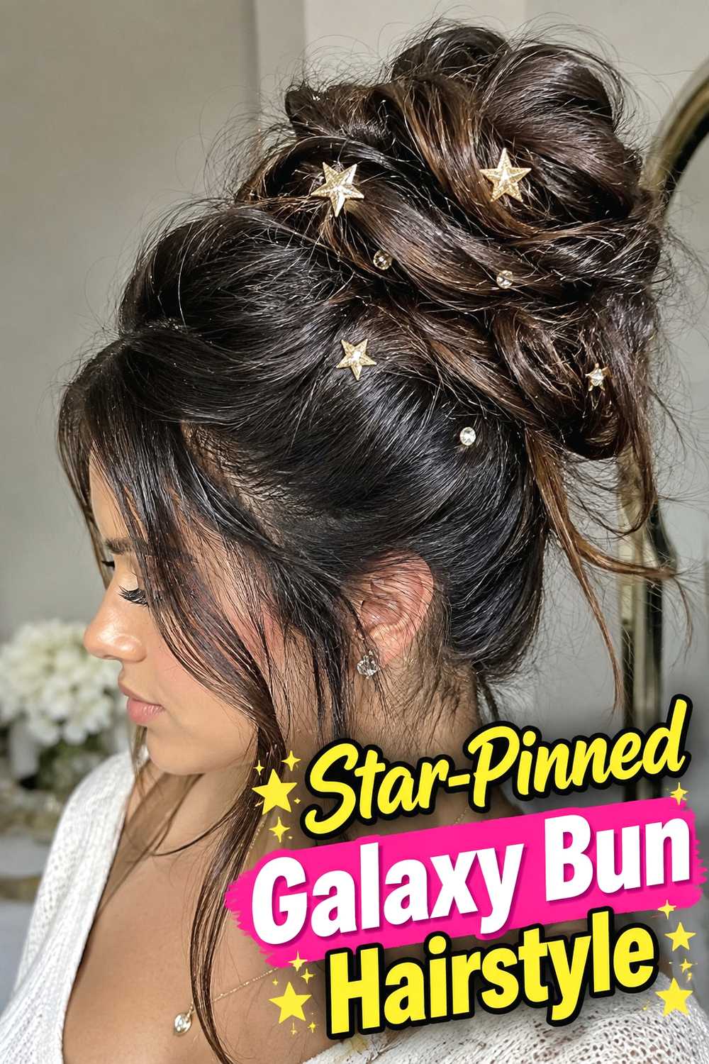 2. Star Pinned Galaxy Bun Hairstyle