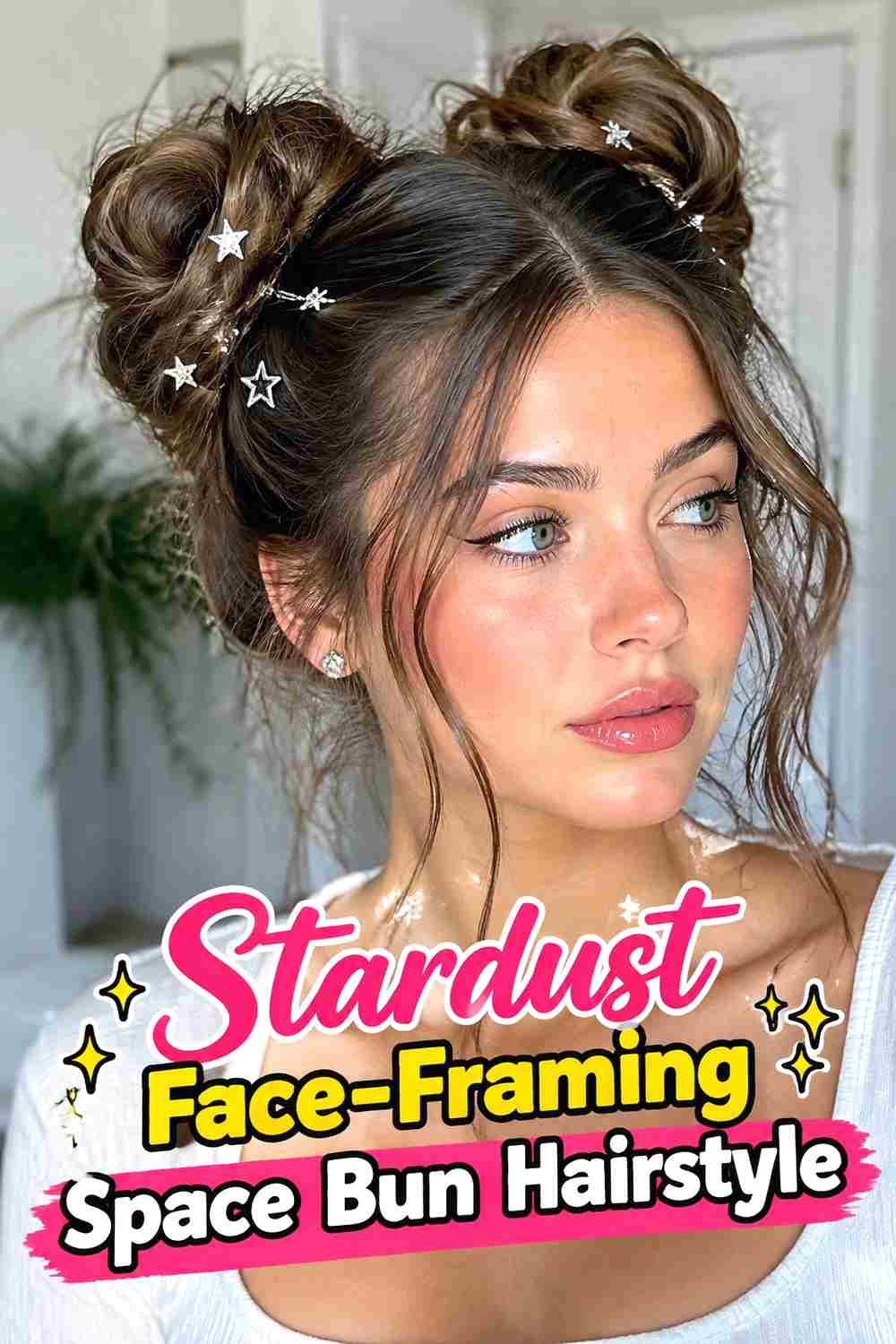 14. Stardust Face Framing Space Bun Hairstyle