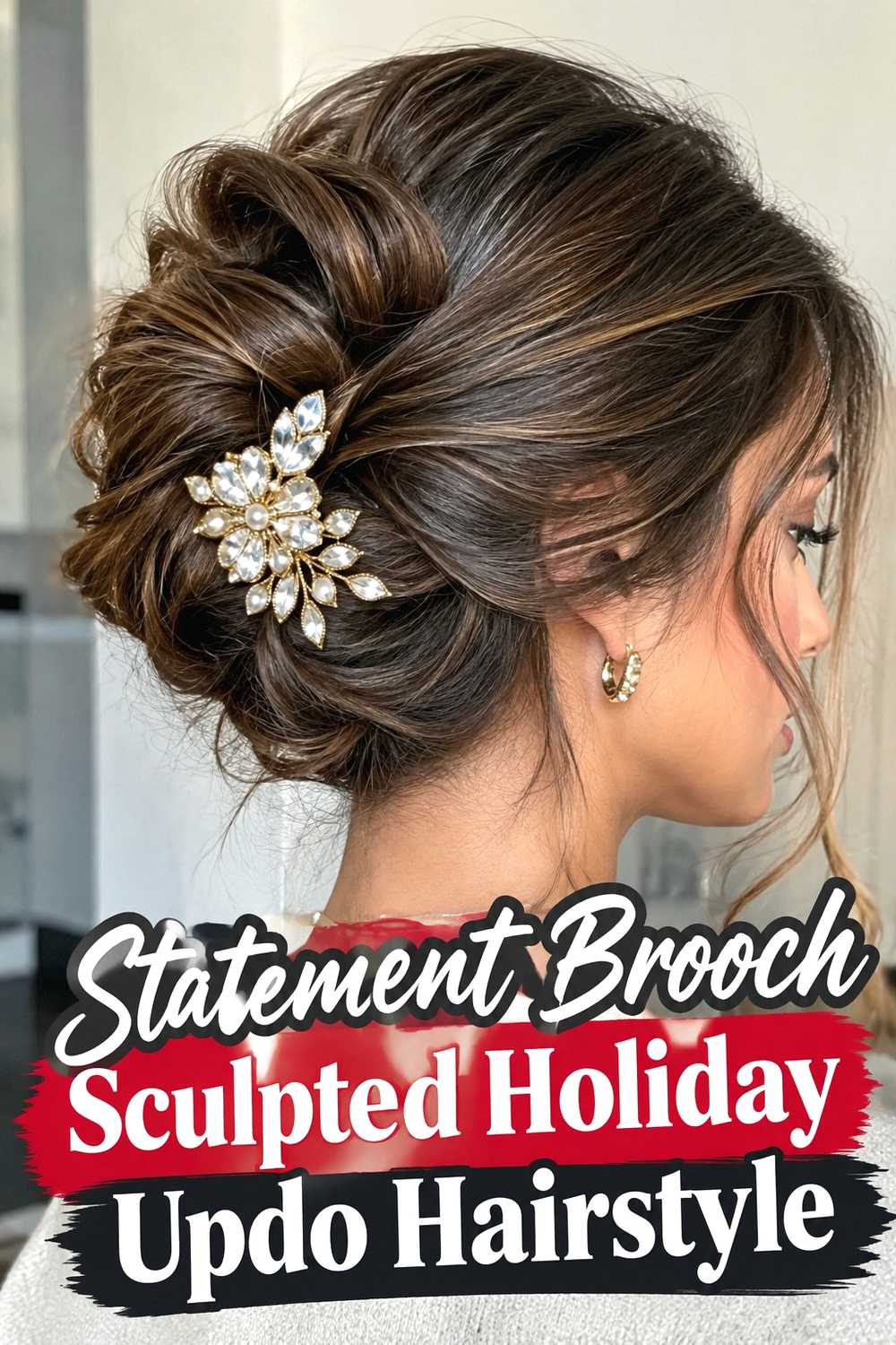 19. Statement Brooch Sculpted Holiday Updo Hairstyle