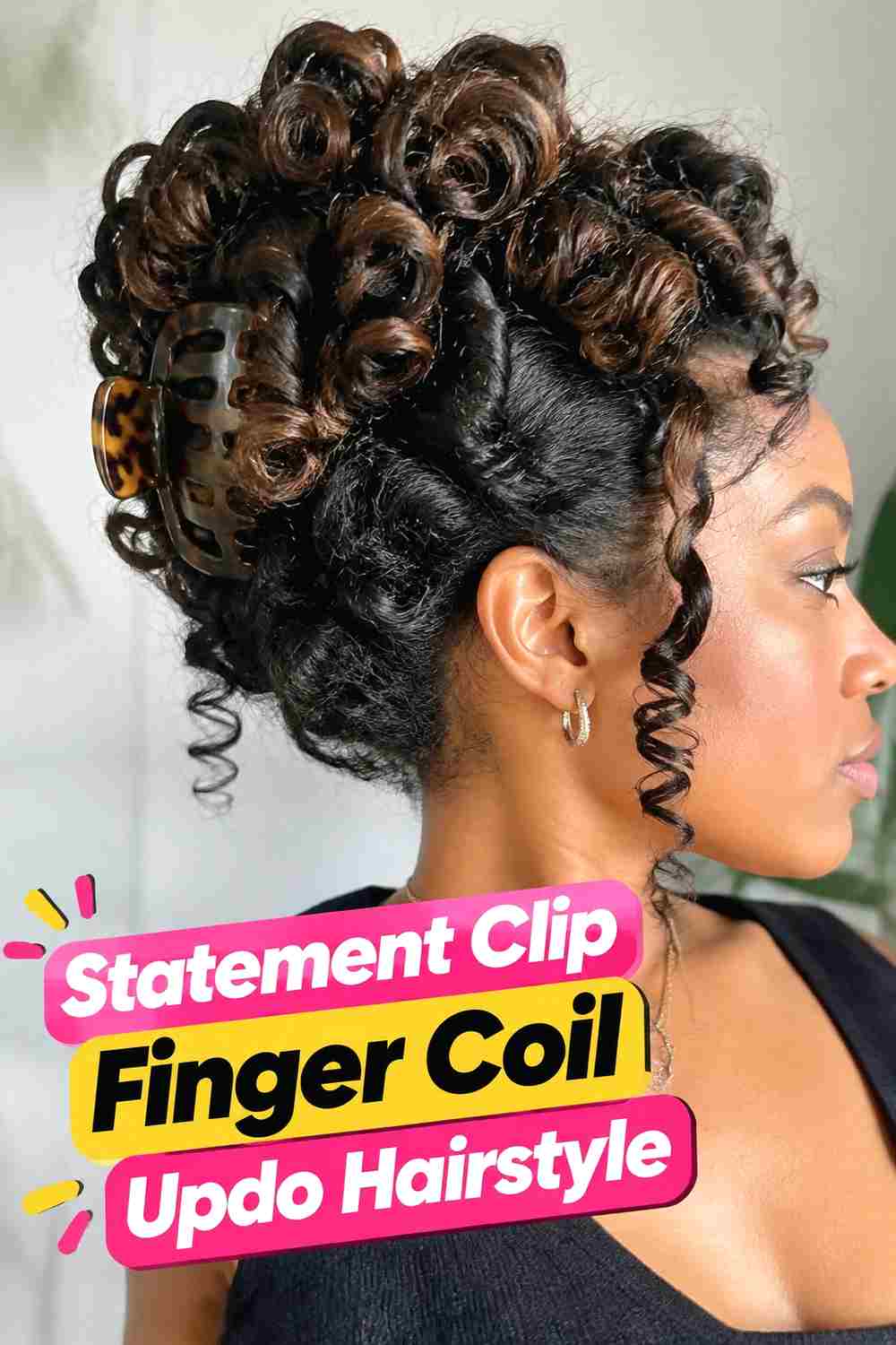 20. Statement Clip Finger Coil Updo Hairstyle