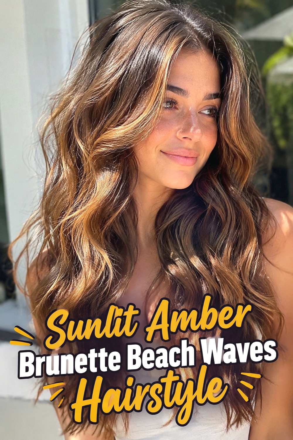 17. Sunlit Amber Brunette Beach Waves Hairstyle