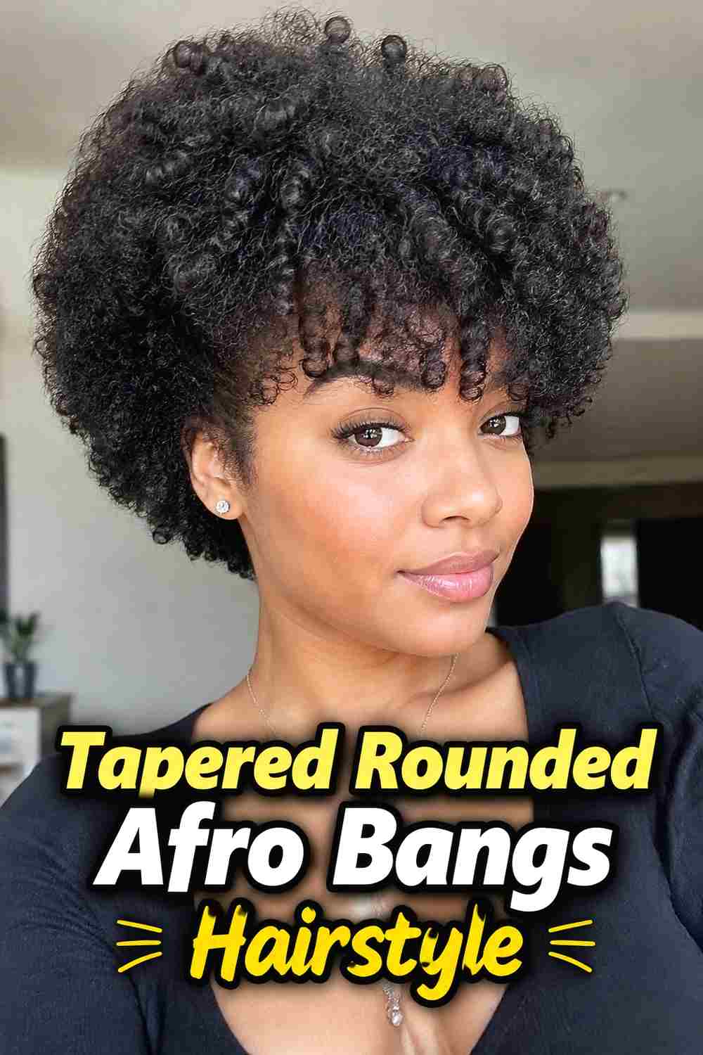 3. Tapered Rounded Afro Bangs Hairstyle