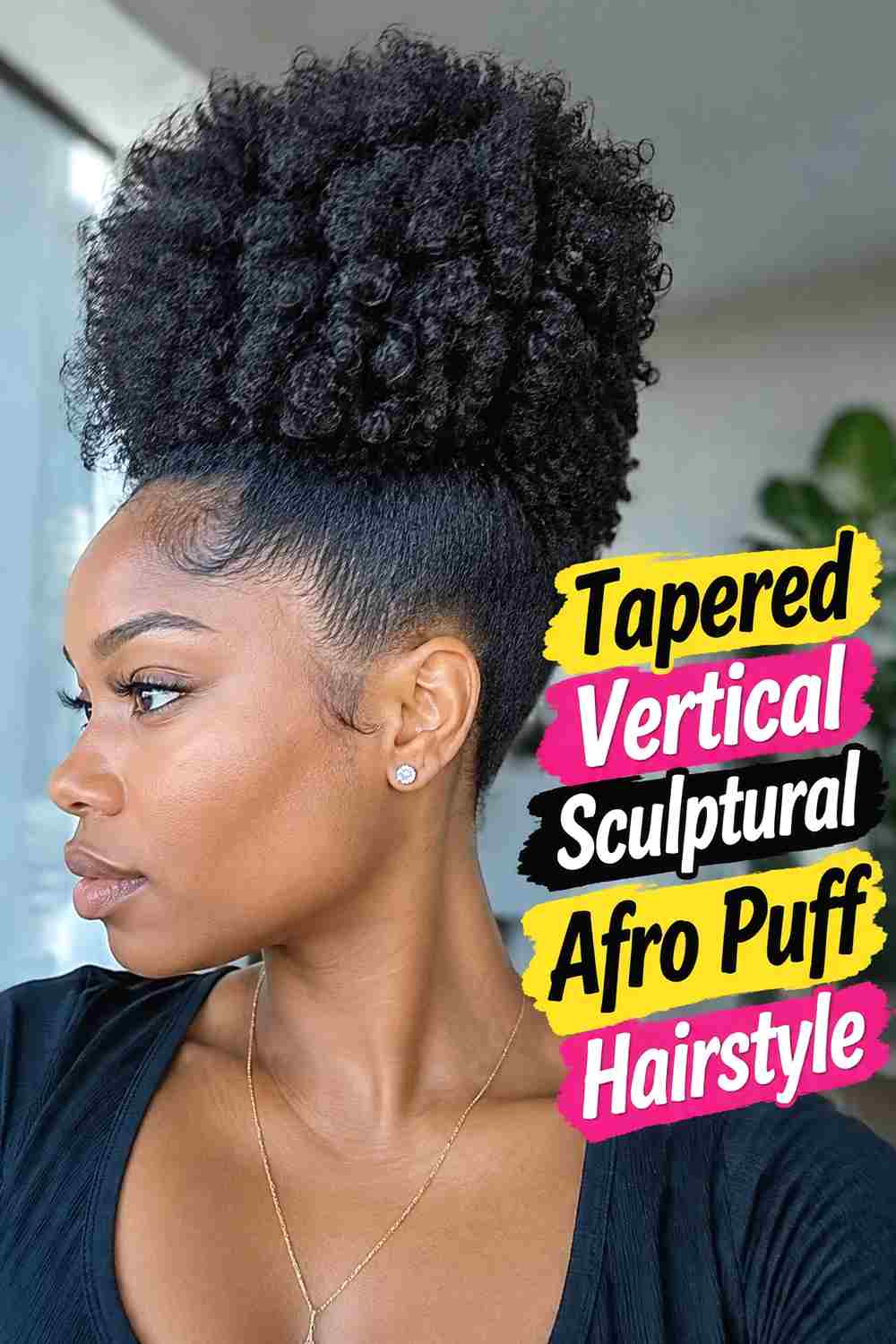 12. Tapered Vertical Sculptural Afro Puff Hairstyle