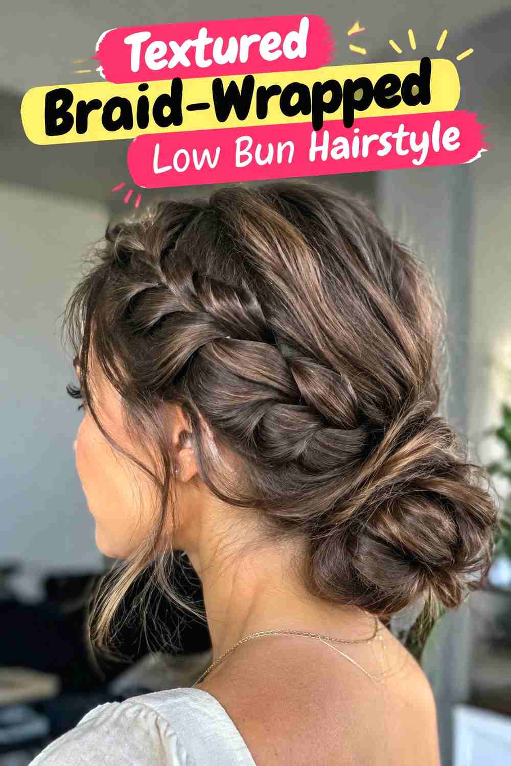 9. Textured Braid Wrapped Low Bun Hairstyle