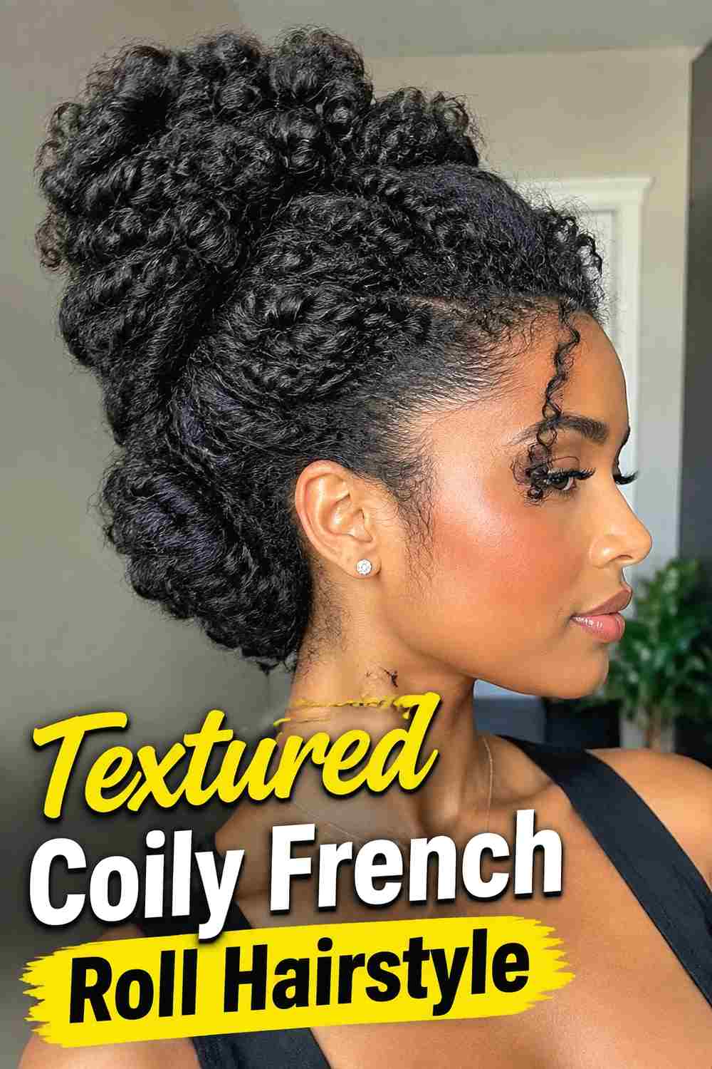 4. Textured Coily French Roll Hairstyle