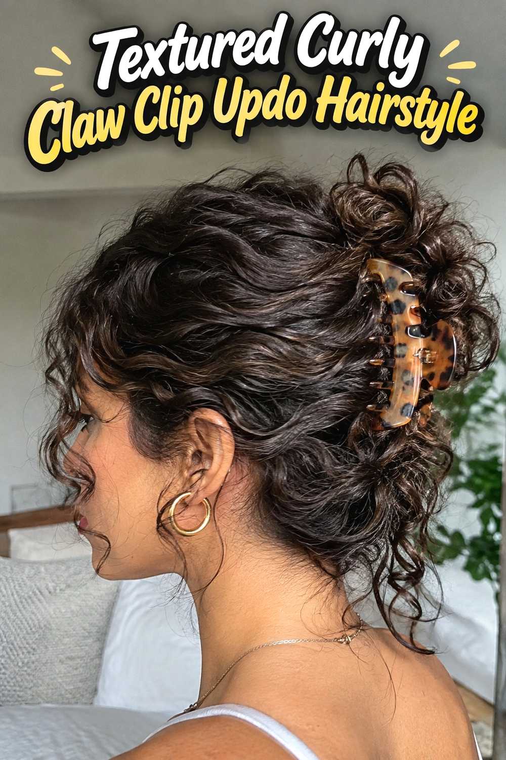 7. Textured Curly Claw Clip Updo Hairstyle