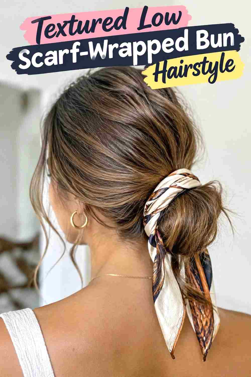 14. Textured Low Scarf Wrapped Bun Hairstyle