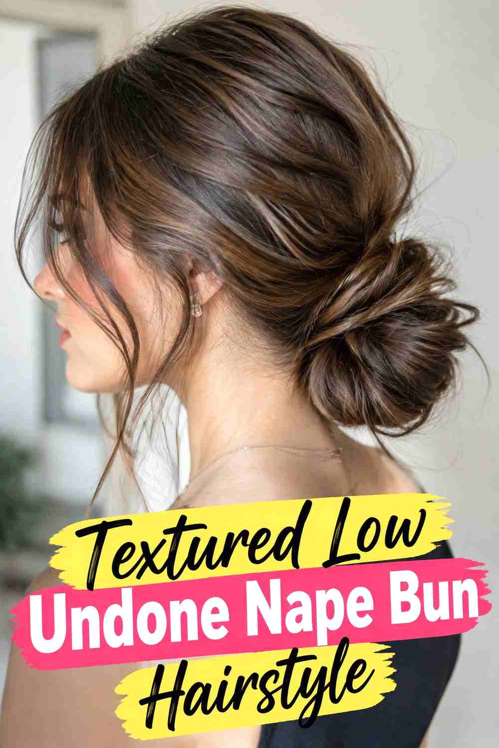 4. Textured Low Undone Nape Bun Hairstyle