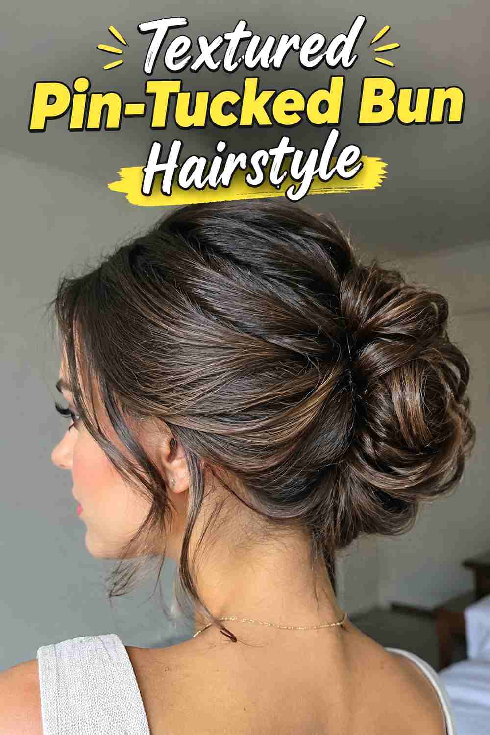 8. Textured Pin Tucked Bun Hairstyle