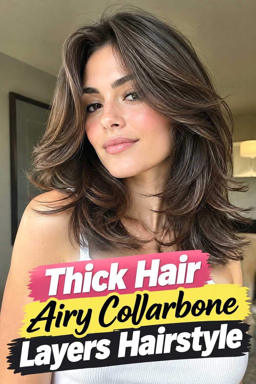 14. Thick Hair Airy Collarbone Layers Hairstyle