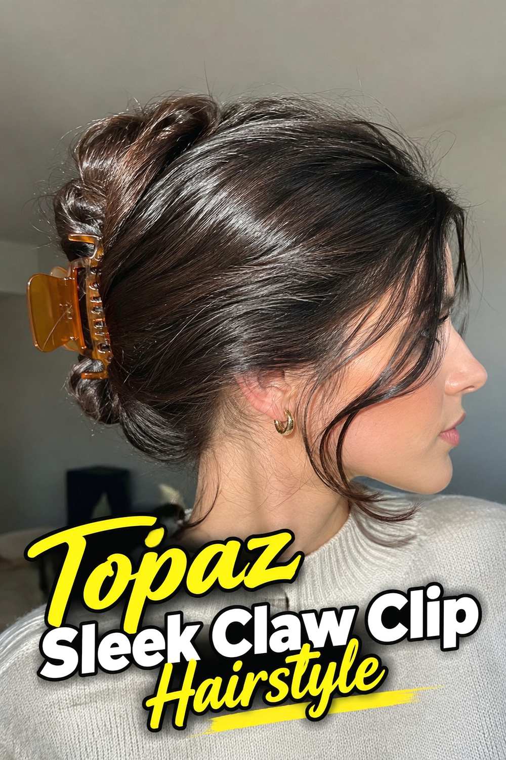 8. Topaz Sleek Claw Clip Hairstyle