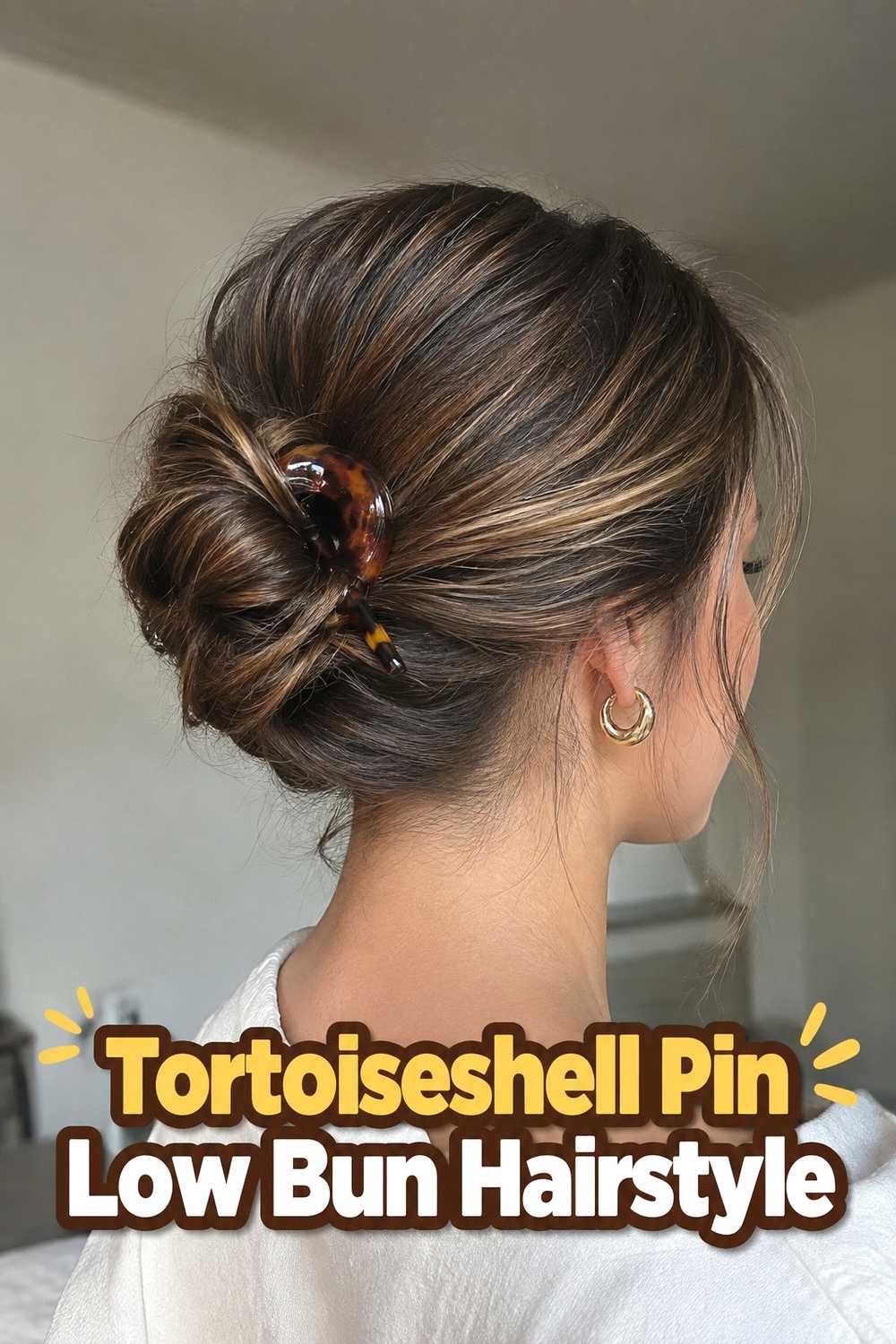 5. Tortoiseshell Pin Low Bun Hairstyle